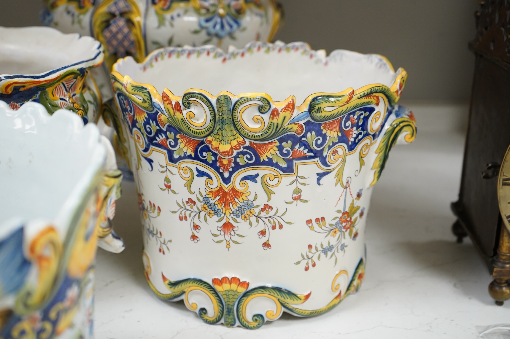 Four various late 19th century French faience planters and jardinières, largest 32cm in diameter